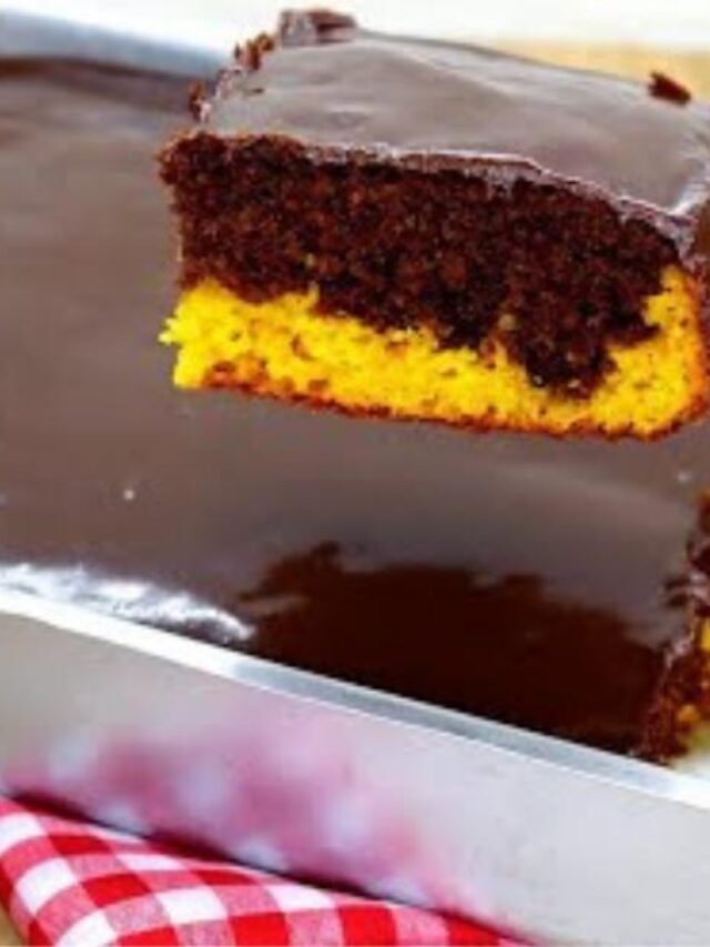 Bolo mesclado de cenoura com chocolate, fofinho e cobertura cremosa, ideal para qualquer ocasião....