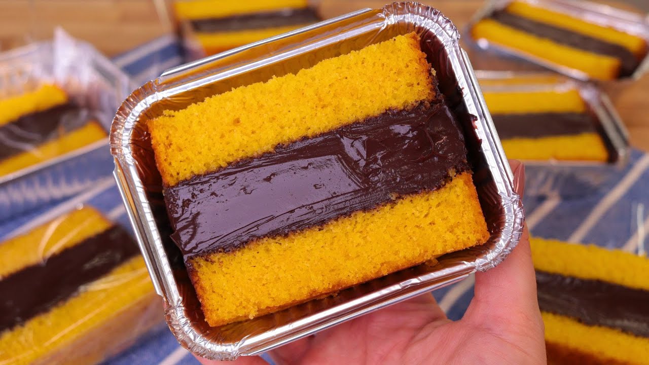 Aprenda a fazer um delicioso slice cake de cenoura com chocolate, fofinho e com recheio...