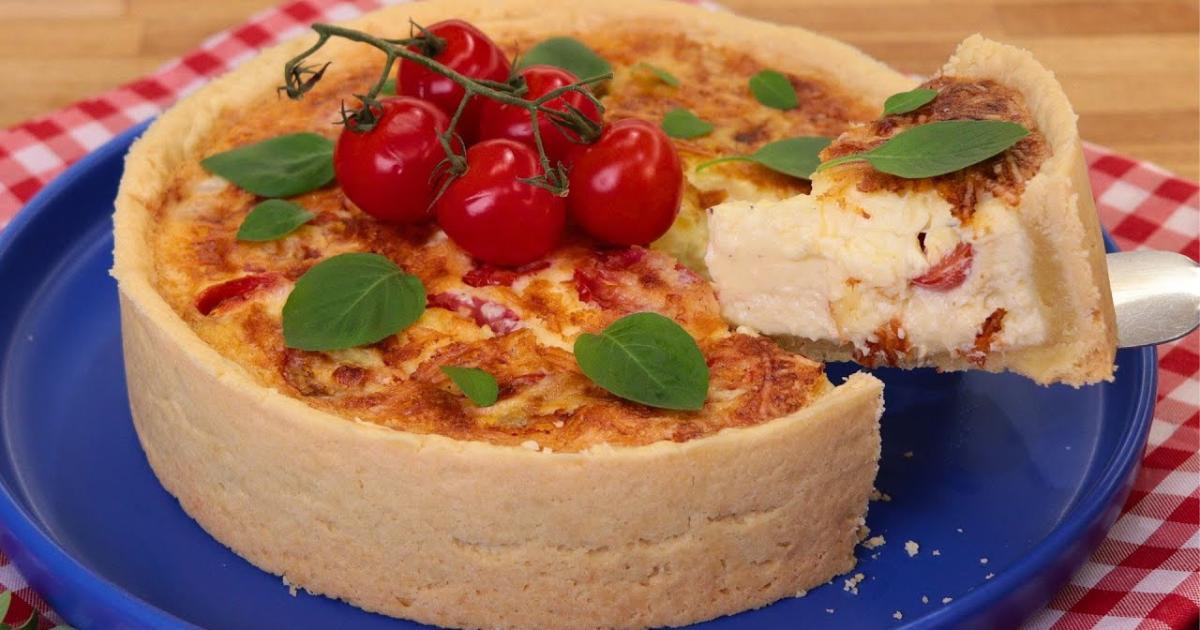 Quiche de queijo cremosa com massa amanteigada e sabor marcante....