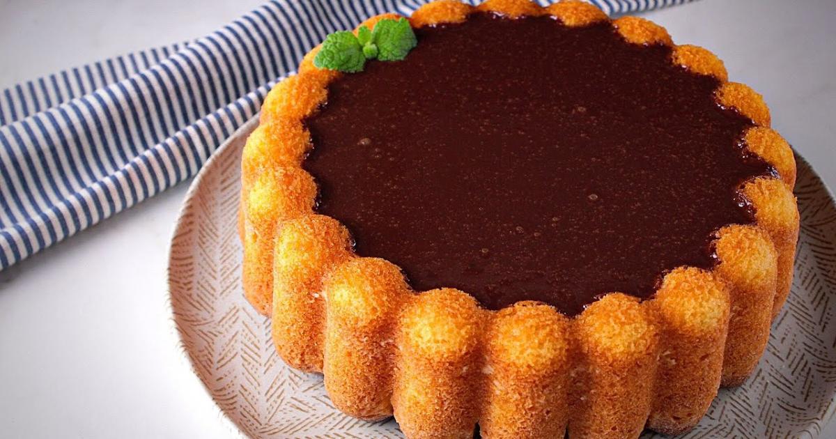 Bolo de laranja super úmido com cobertura de chocolate e toque cítrico....