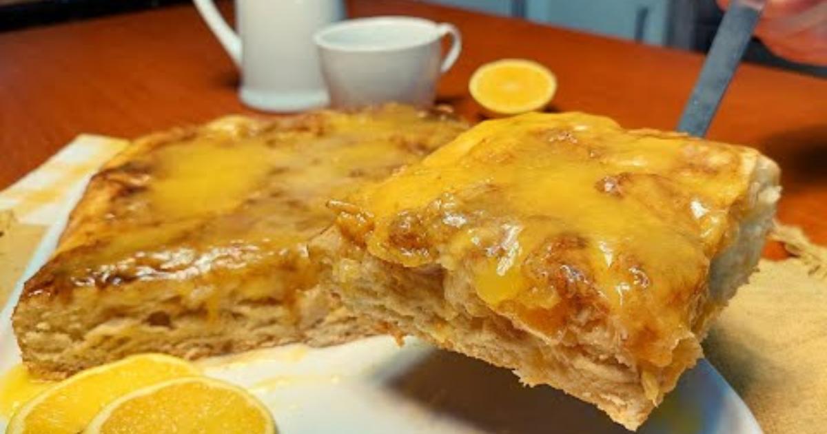 Aprenda a fazer uma cuca de laranja cremosa e deliciosa....