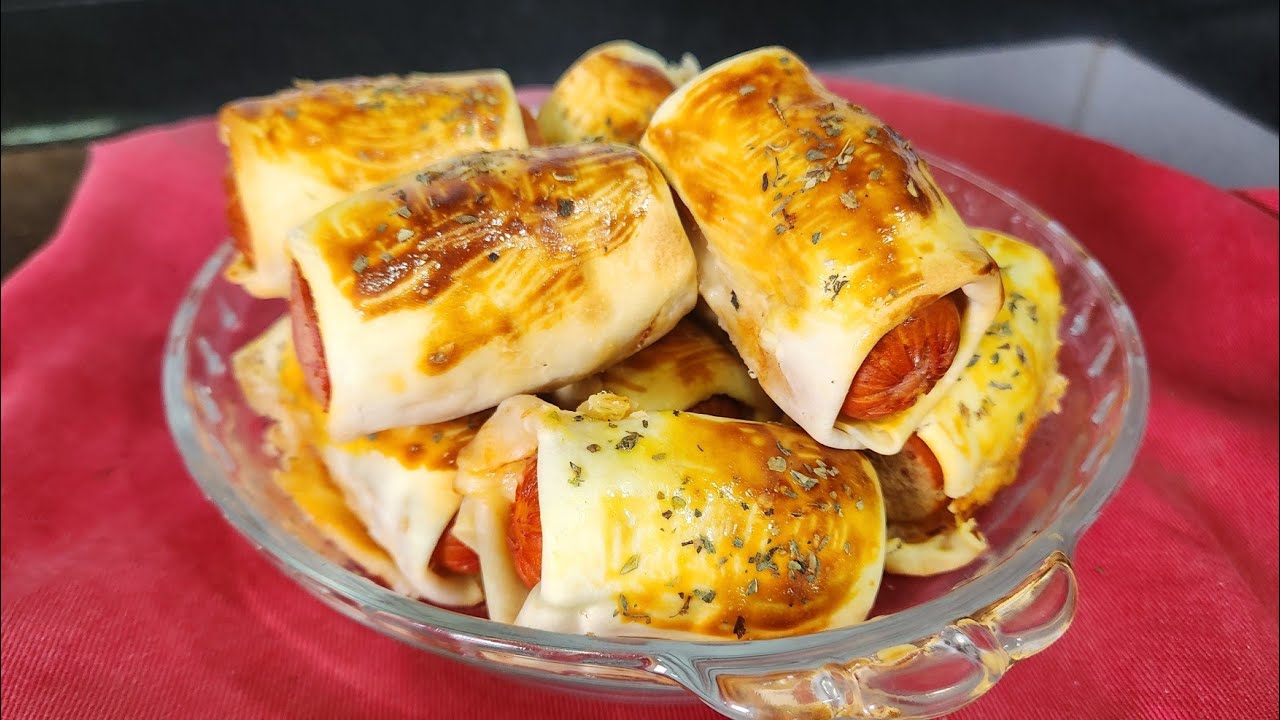 Aprenda a fazer enroladinho de salsicha com massa de pastel na Air Fryer, uma delícia...