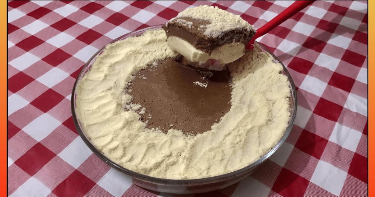Mousse dois amores com chocolate e leite ninho em duas camadas cremosas....